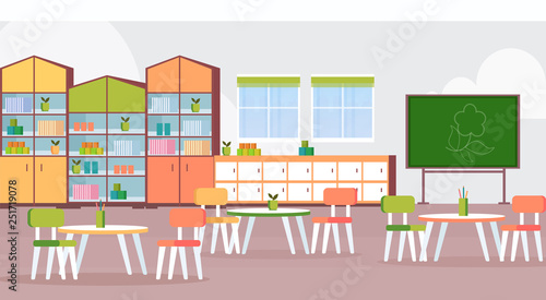 preschool modern kindergarten children classroom with chalkboard desks and chairs decoration furniture empty no people kid room interior flat horizontal