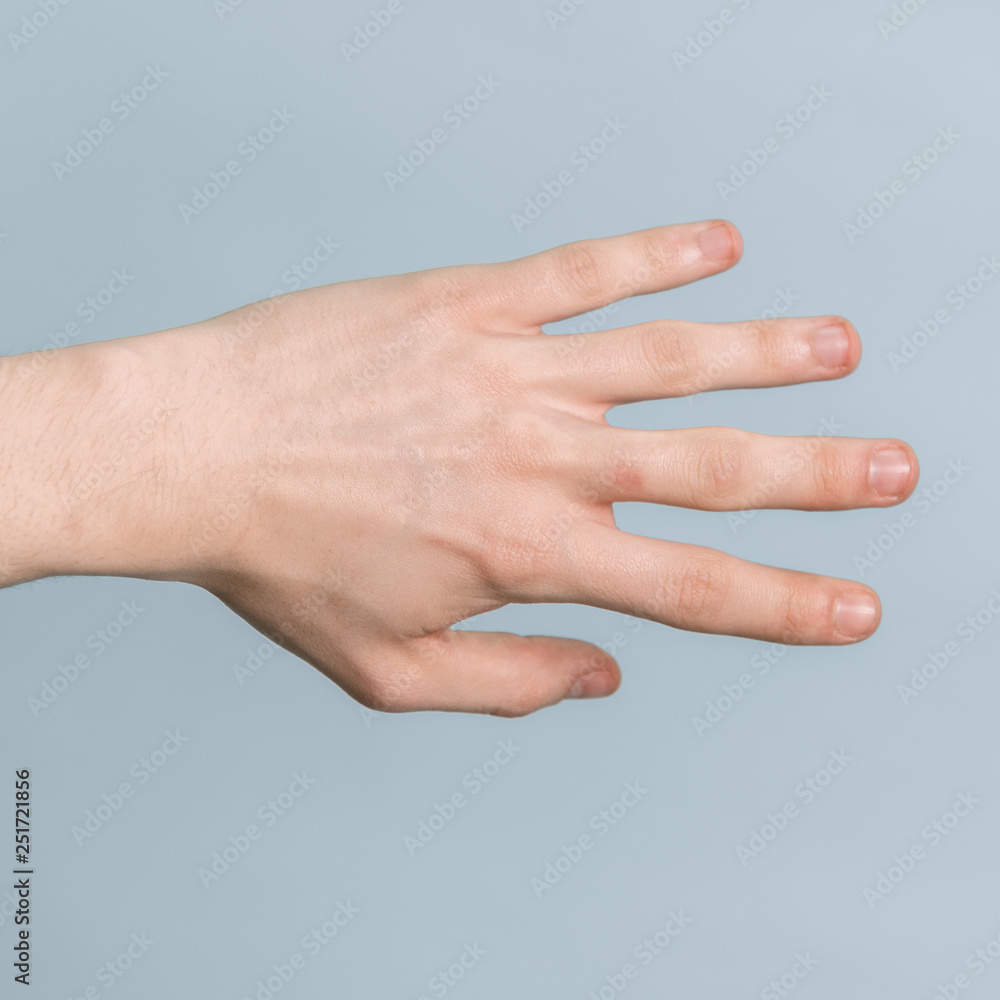 Man hand on light background Man hand on light background
