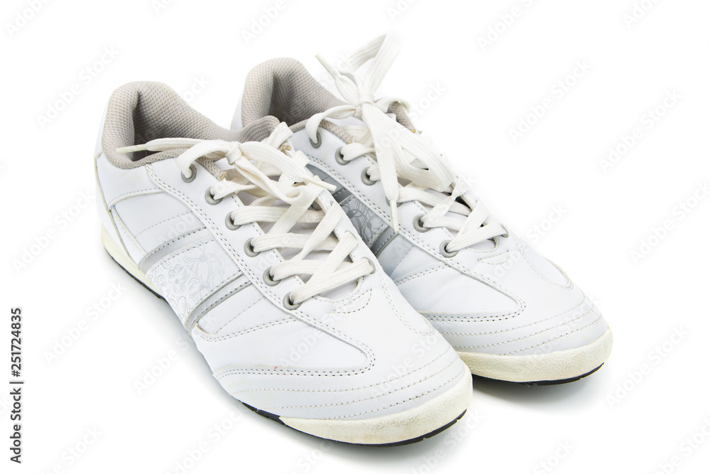 Women's leather sneakers with white lacing on isolated background 