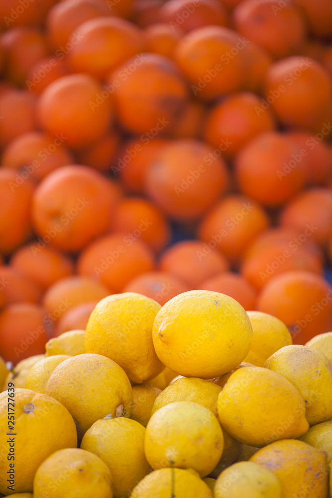 Fresh oranges and lemons close up. Fresh oranges and lemons close up.
