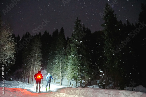 Night skitour in the mountain under stars