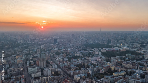 Aerial top view of Kiev city skyline on sunset from above, Kyiv center downtown cityscape in evening, capital of Ukraine © Iuliia Sokolovska