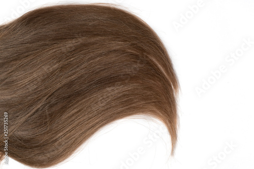 Hair on a white Terry towel.Wet and dry dark brown, blond hair.Clean hair on a towel