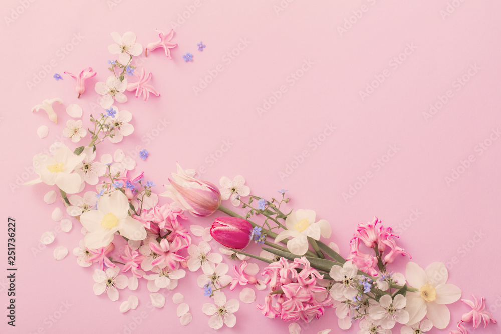 beautiful spring flowers on paper background - obrazy, fototapety, plakaty 