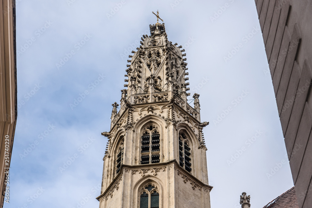 Vienna, Austria - December 31, 2017. Close view of openwork spire of Maria am Gestade aka St. Mary on the Bank - oldest gothic viennese church. Details of medieval lacy bell tower.