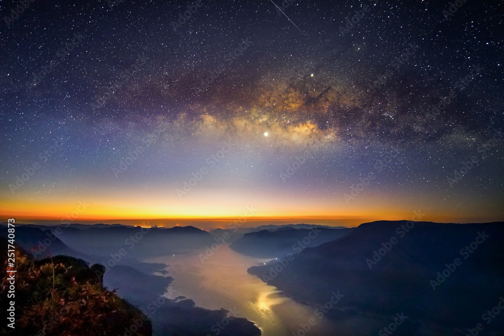 Landscape Milky Way rises over on mountain Pha Daeng Luang, Mae Ping National Park, Lamphun in Thailand