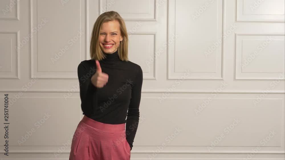 Boss model with a confident thumbs up Boss model with a confident thumbs up