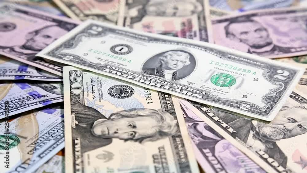American money dollars bank notes on rotating surface background. American money dollars bank notes on rotating surface background.
