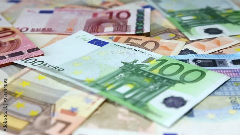 European bank notes euro on rotating surface background European bank notes euro on rotating surface background