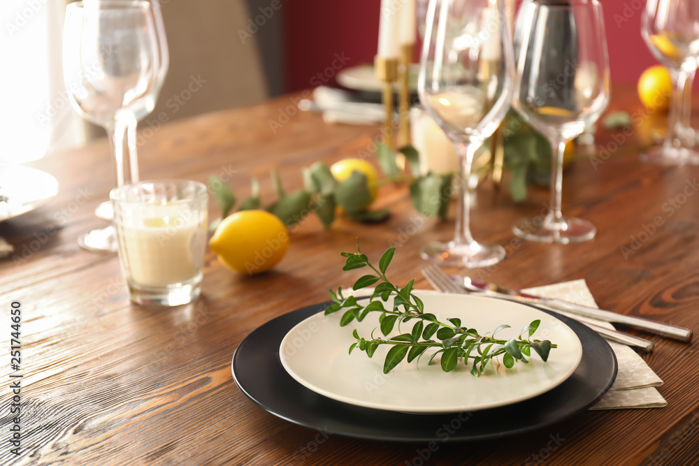 Beautiful table setting in dining room Beautiful table setting in dining room