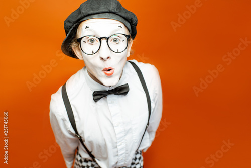 Slika na platnu Portrait of an actor as a pantomime with white facial makeup showing expressive