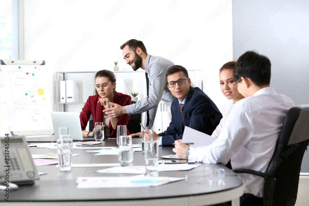 Young people having business meeting in office Young people having business meeting in office