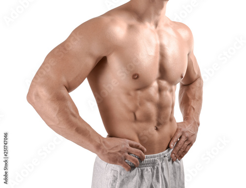 Muscular bodybuilder on white background