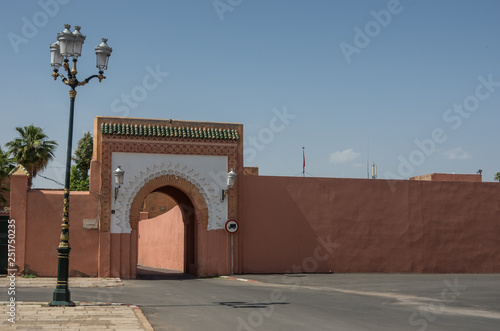 Gate in old city walls, Marrakech medina, Morocco photo