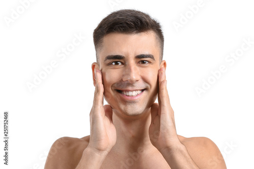 Man giving himself face mas...