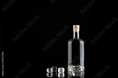 Obraz na płótnie bottle of vodka on black background w salonie