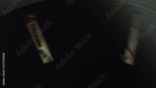  Zoetrope with human pictures in motion. View of fast rotating disc with images of human inside of zoetrope cylinder.