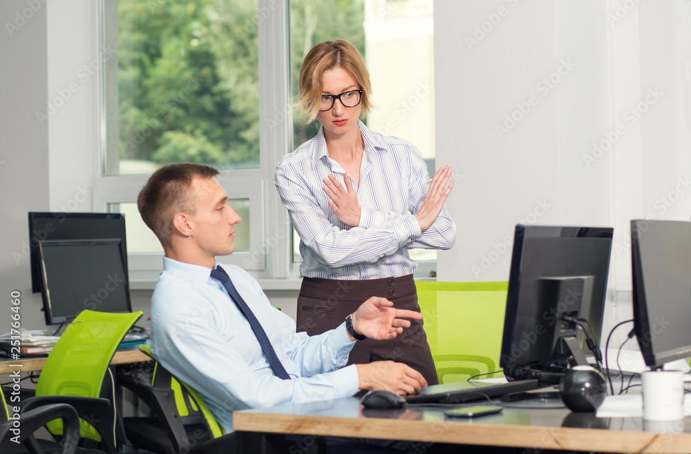 Disagreement. No, woman do not agree, gesture is a prohibition, refusal. Female manager flatly refuses, shows his crossed arms in front of him. Interviewing, negotiations, consultation in the office. Disagreement. No, woman do not agree, gesture is a prohibition, refusal. Female manager flatly refuses, shows his crossed arms in front of him. Interviewing, negotiations, consultation in the office.