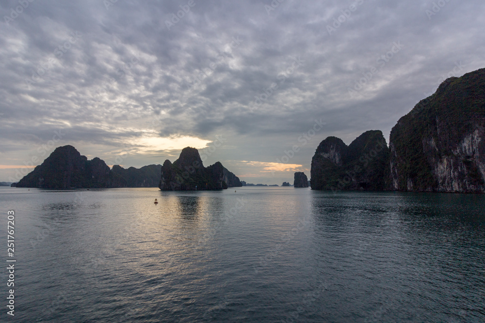 Sunrise panorama at Ha Long Bay tourist destination in Asia. Gulf of Tonkin in the South China Sea, Vietnam.