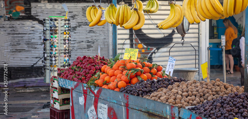 Fototapeta Naklejka Na Ścianę i Meble -  Fruits and nuts on a street market stall, Athens Greece