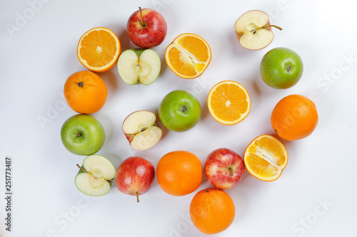 mix green red apple orange whole fruit cut slice half on white background