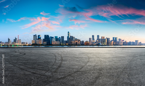 Empty asphalt square ground and Hangzhou business district cityscape © ABCDstock