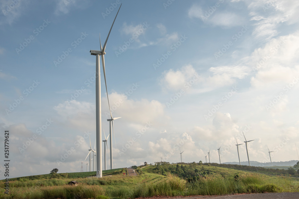 Wind farm. Wind turbines generating electricity Wind farm. Wind turbines generating electricity