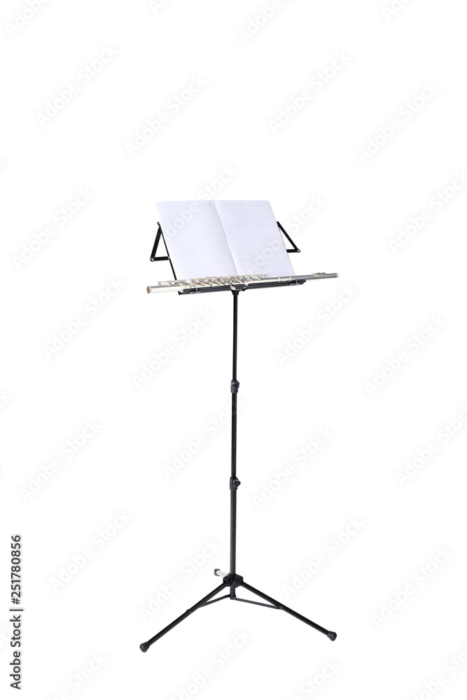 transverse flute and music score rest on a music stand isolated on white background with clipping path and copy space for your text transverse flute and music score rest on a music stand isolated on white background with clipping path and copy space for your text