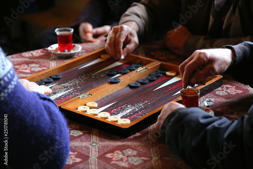 people playing backgammon