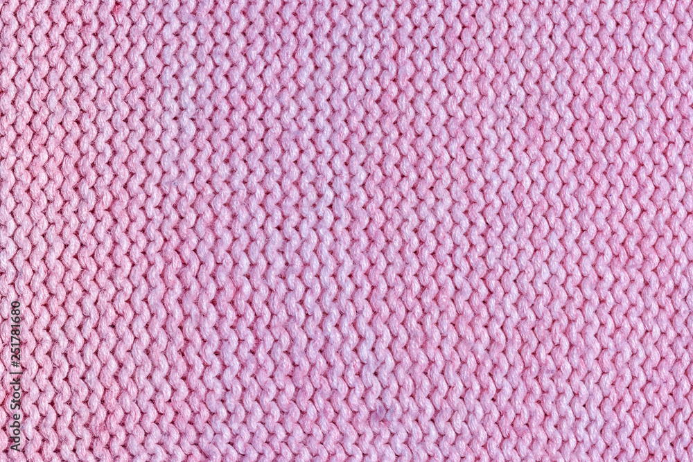 Texture, pink knitted jersey close up. Blank wool background. Texture, pink knitted jersey close up. Blank wool background.