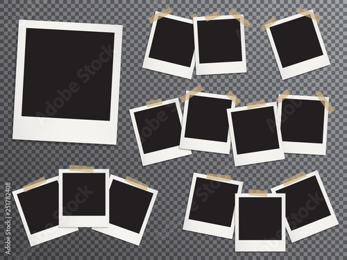 Blank photo frames set hanging on adhesive tape 
