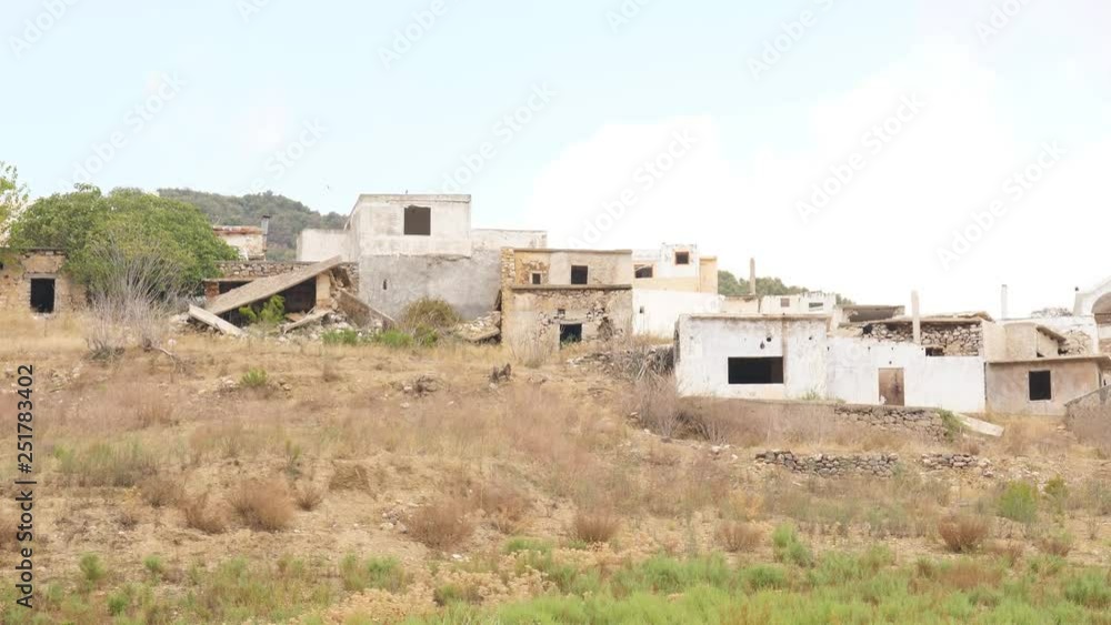 Destroyed houses in old abandoned village