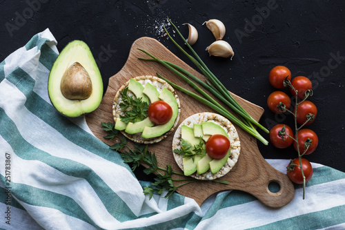 Vegan breakfast rice tortillas avocado tomato spices onions