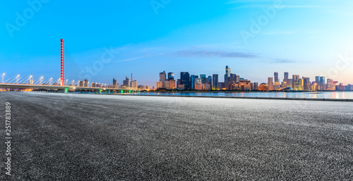 Empty asphalt road through Hangzhou business district,panoramic view