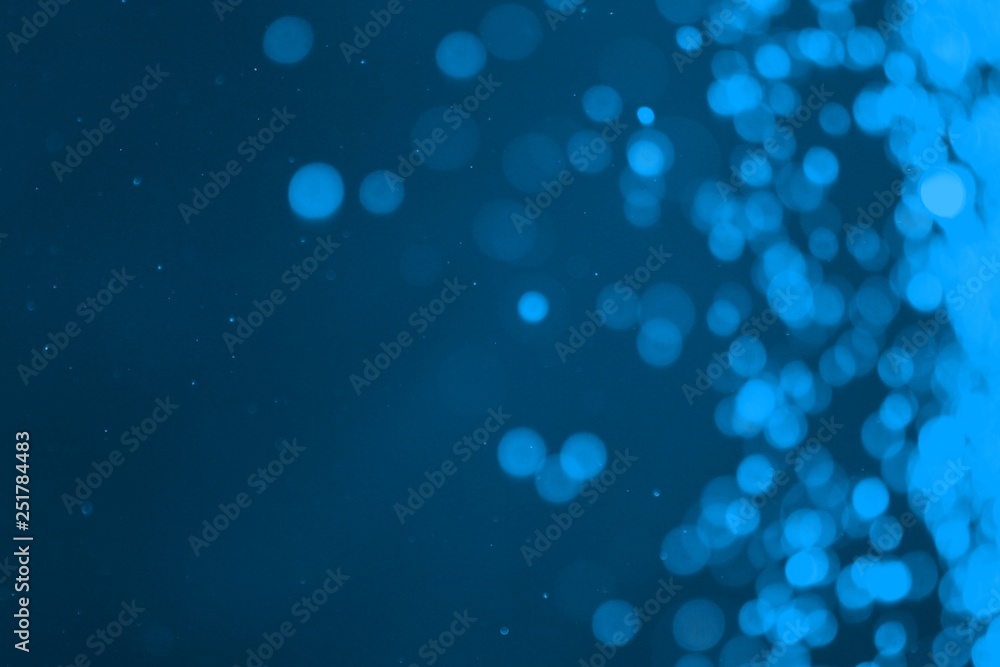 light blue shiny sparkles one side frame bokeh texture - wonderful abstract photo background