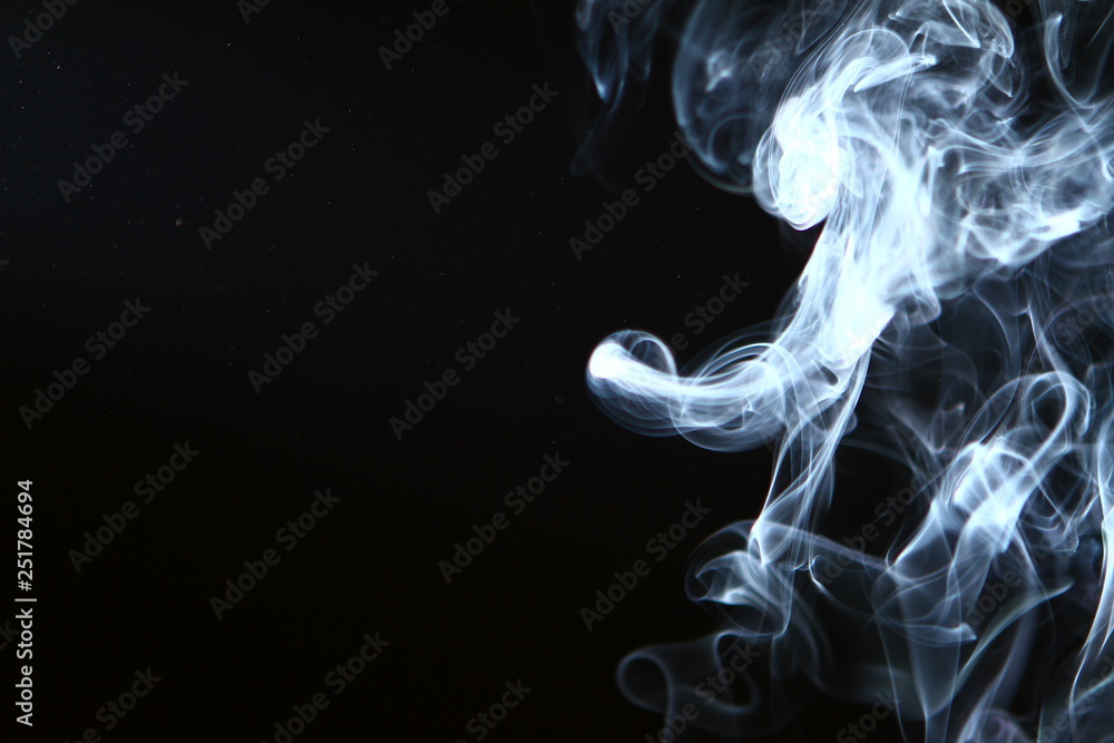 wonderful abstract glowing blue smoke on dark background. wonderful abstract glowing blue smoke on dark background.