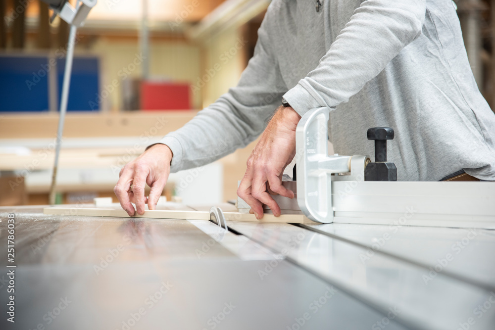 Fototapeta premium Carpenter work on wood plank