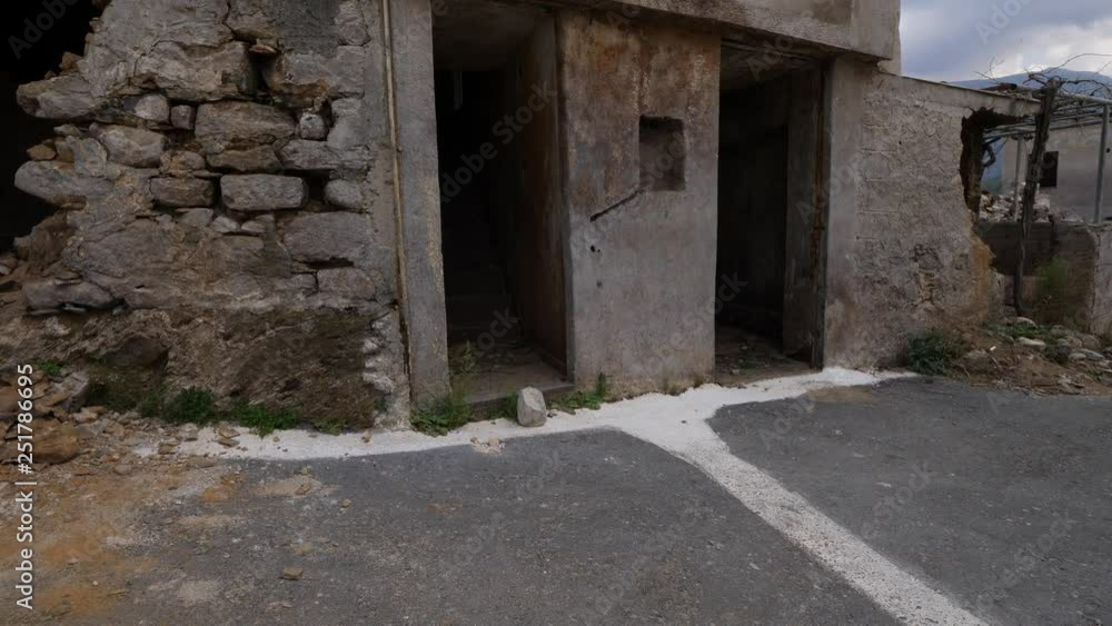 Old village building without doors and windows and ruined walls Old village building without doors and windows and ruined walls