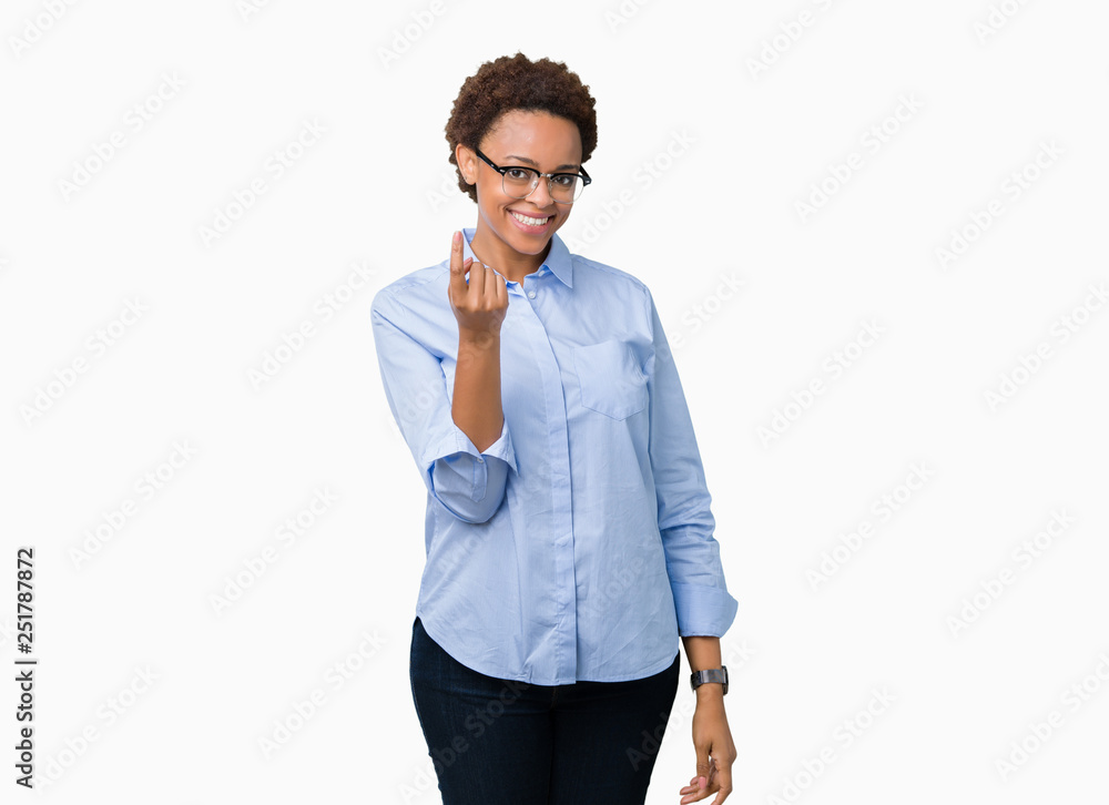 Young beautiful african american business woman over isolated background Beckoning come here gesture with hand inviting happy and smiling Young beautiful african american business woman over isolated background Beckoning come here gesture with hand inviting happy and smiling
