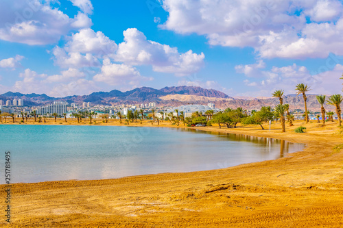 Cityscape of Eilat viewed behind the peace lagoon, Israel photo