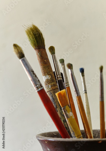 Photo of paint brushes in a jar