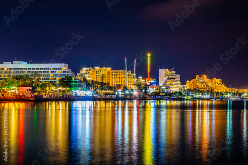 Sunset view of hotels in israeli holiday resort Eilat, Israel photo