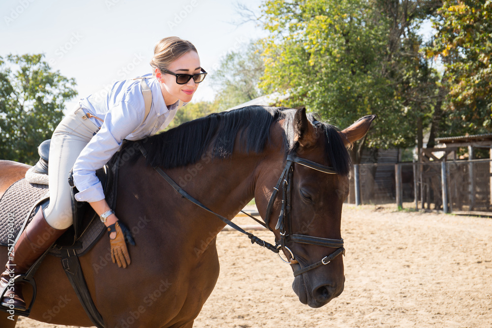 Beautiful woman horsewoman, close-up Beautiful woman horsewoman, close-up