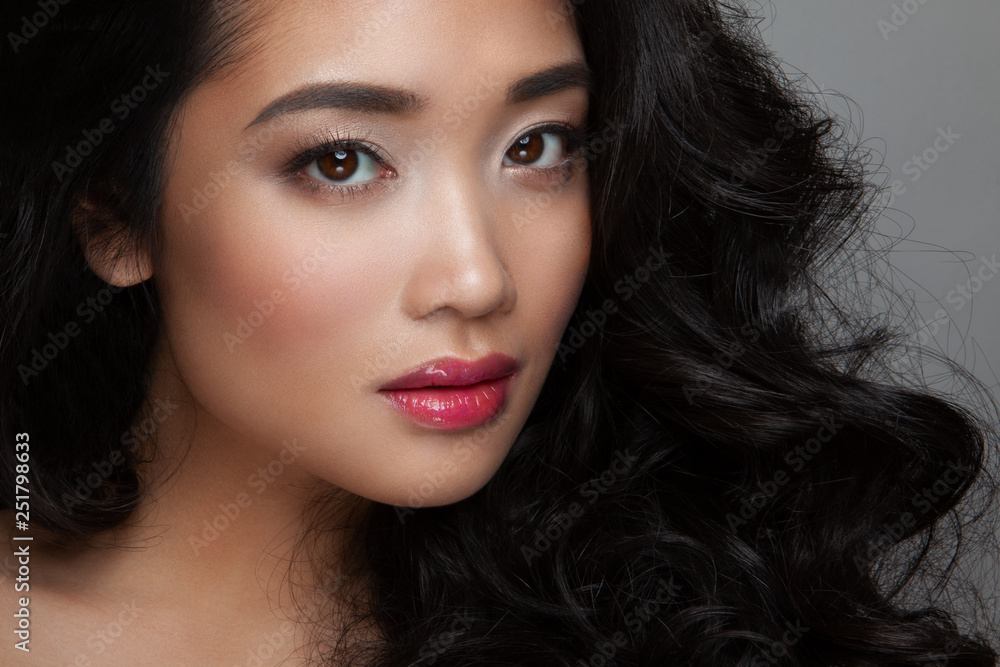 closeup young woman face with clean skin, pink lips closeup young woman face with clean skin, pink lips