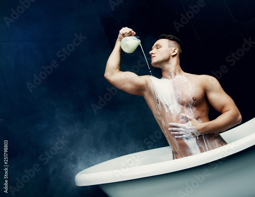  man taking a bath with milk