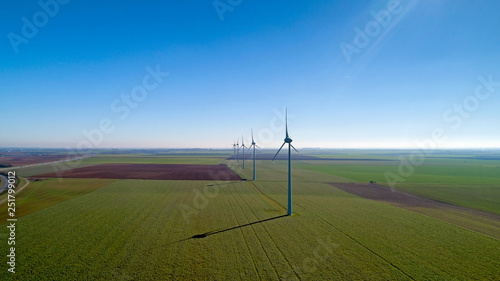 Wind turbines in the fields, Le Langon, France photo