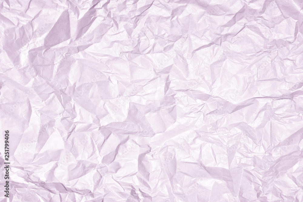 Texture of heavily wrinkled light lilac paper. Empty background.