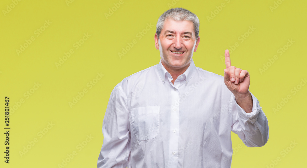 Handsome senior man over isolated background showing and pointing up with finger number one while smiling confident and happy. Handsome senior man over isolated background showing and pointing up with finger number one while smiling confident and happy.