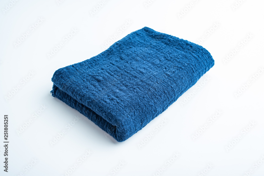 Folded blue washed linen fabric
