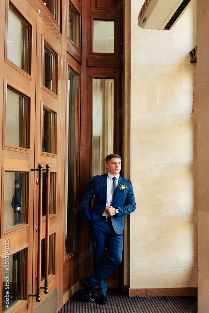 the groom in a wedding suit, a man preparing for the wedding 1 the groom in a wedding suit, a man preparing for the wedding 1